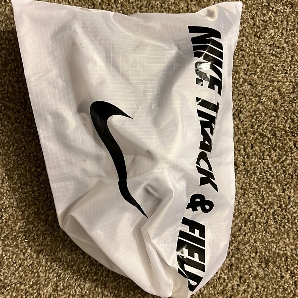 Nike Track and Field shoes, size 7.5, white